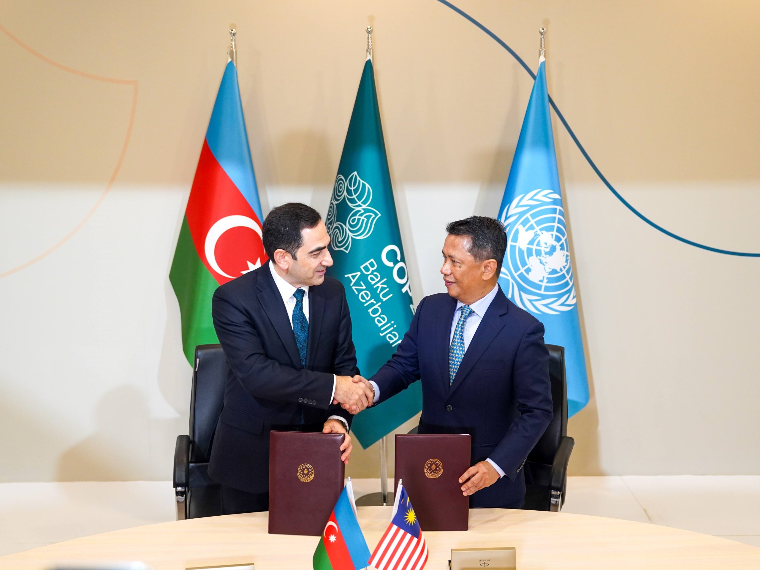 Port of Baku and Malaysia's Citaglobal signs power purchase agreement to establish the first 5.4 MW solar facility in Azerbaijan on 16 November 2024 during COP29 in Baku, Azerbaijan. From left: Dr Taleh Ziyadov, director-general of the Port of Baku; and Tan Sri Dr Norza Zakaria, president of Tiza Green Energy LLC and executive chairman and president of Citaglobal Berhad. | Photo by Citaglobal / NHA File Photo