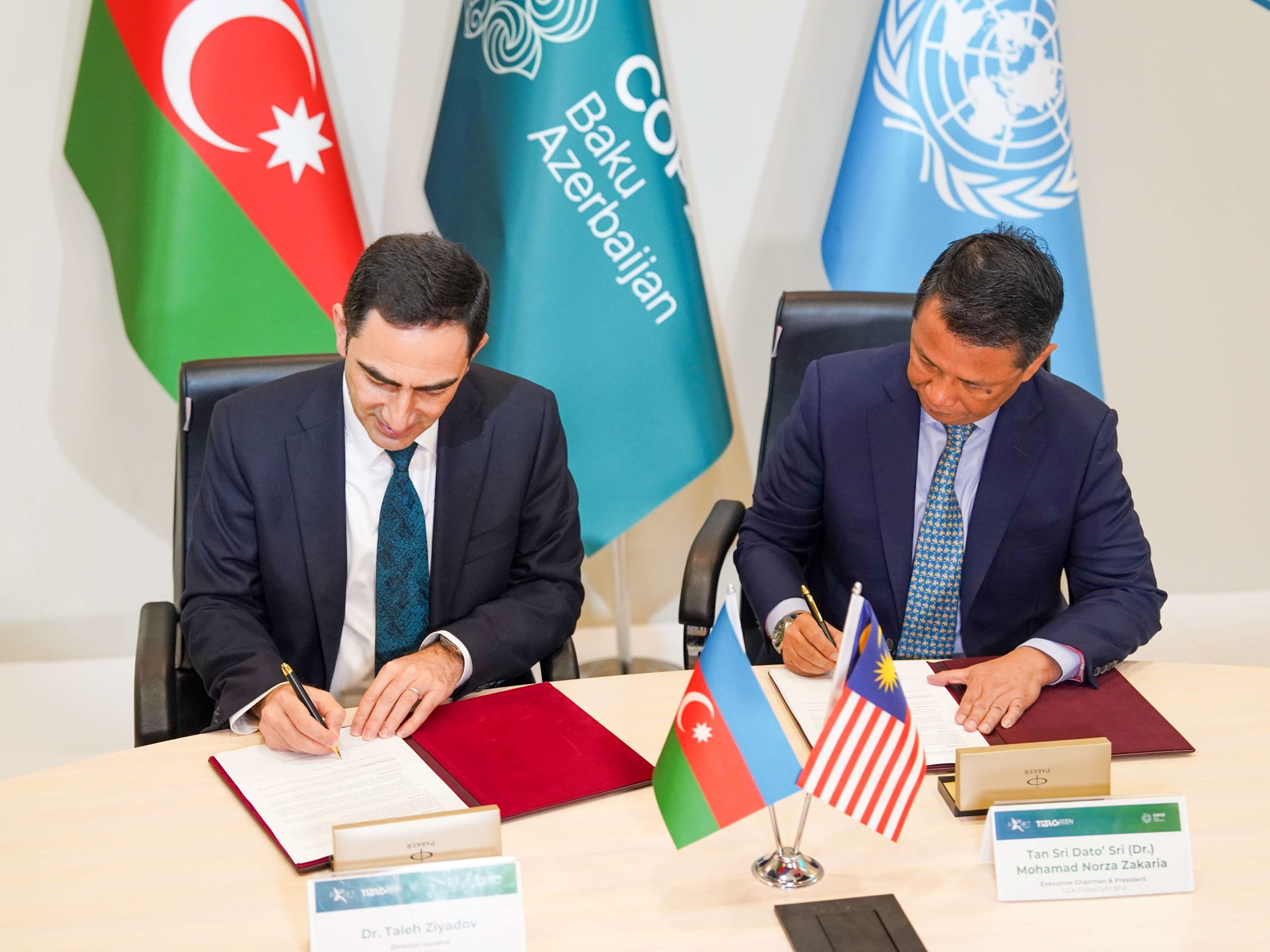 Port of Baku and Malaysia's Citaglobal signs power purchase agreement to establish the first 5.4 MW solar facility in Azerbaijan on 16 November 2024 during COP29 in Baku, Azerbaijan. From left: Dr Taleh Ziyadov, director-general of the Port of Baku; and Tan Sri Dr Norza Zakaria, president of Tiza Green Energy LLC and executive chairman and president of Citaglobal Berhad. | Photo by Citaglobal / NHA File Photo