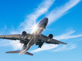 Photo for illustrative purposes only. Aircraft flying mid air against blue sky and strips of white clouds. | Photo by gyro / Getty Images (via Canva Pro) / NHA File Photo